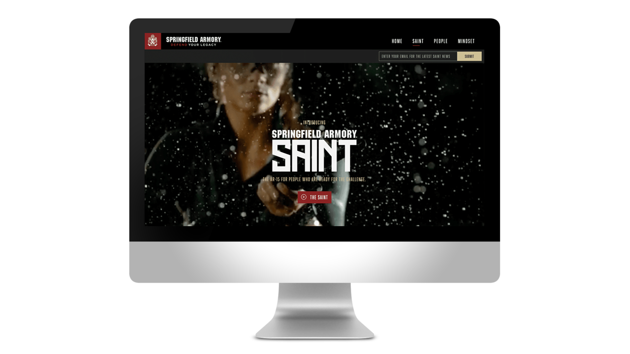 A desktop computer featuring a branded website with video integrated elements from a branded content docu-reality series titled of Night of the Saint