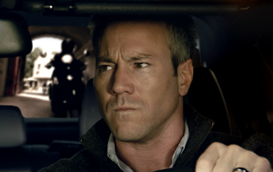 Ignite Energy Branded Content film written and directed by Dallas Filmmaker Christopher Bigbie featuring an exciting black Mercedes car chase starring Jeff Plunk and Jill Sargent Waterston with a License to Thrill